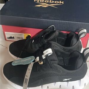 Womens sz 8 Reebok Black and White Athletic Shoes